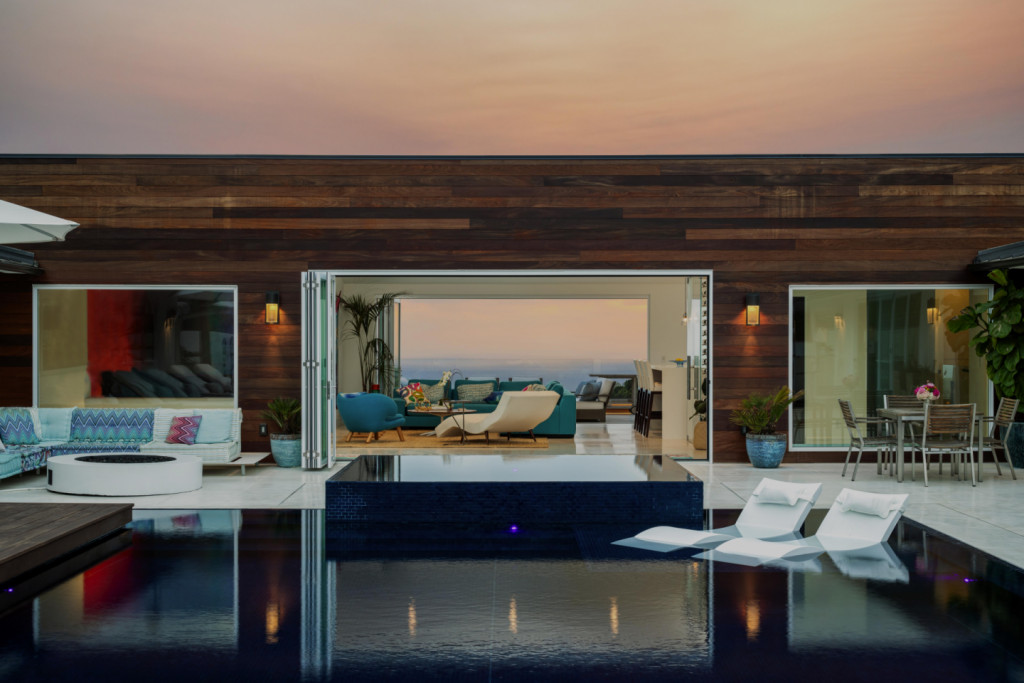 LaCantina folding glass wall opening a living room to the outdoors