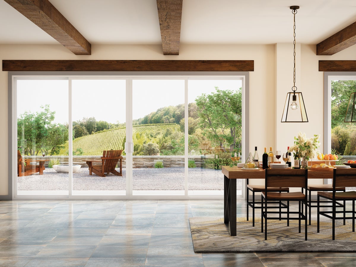 Milgard Trinsic V300 vinyl sliding patio door in a dining room