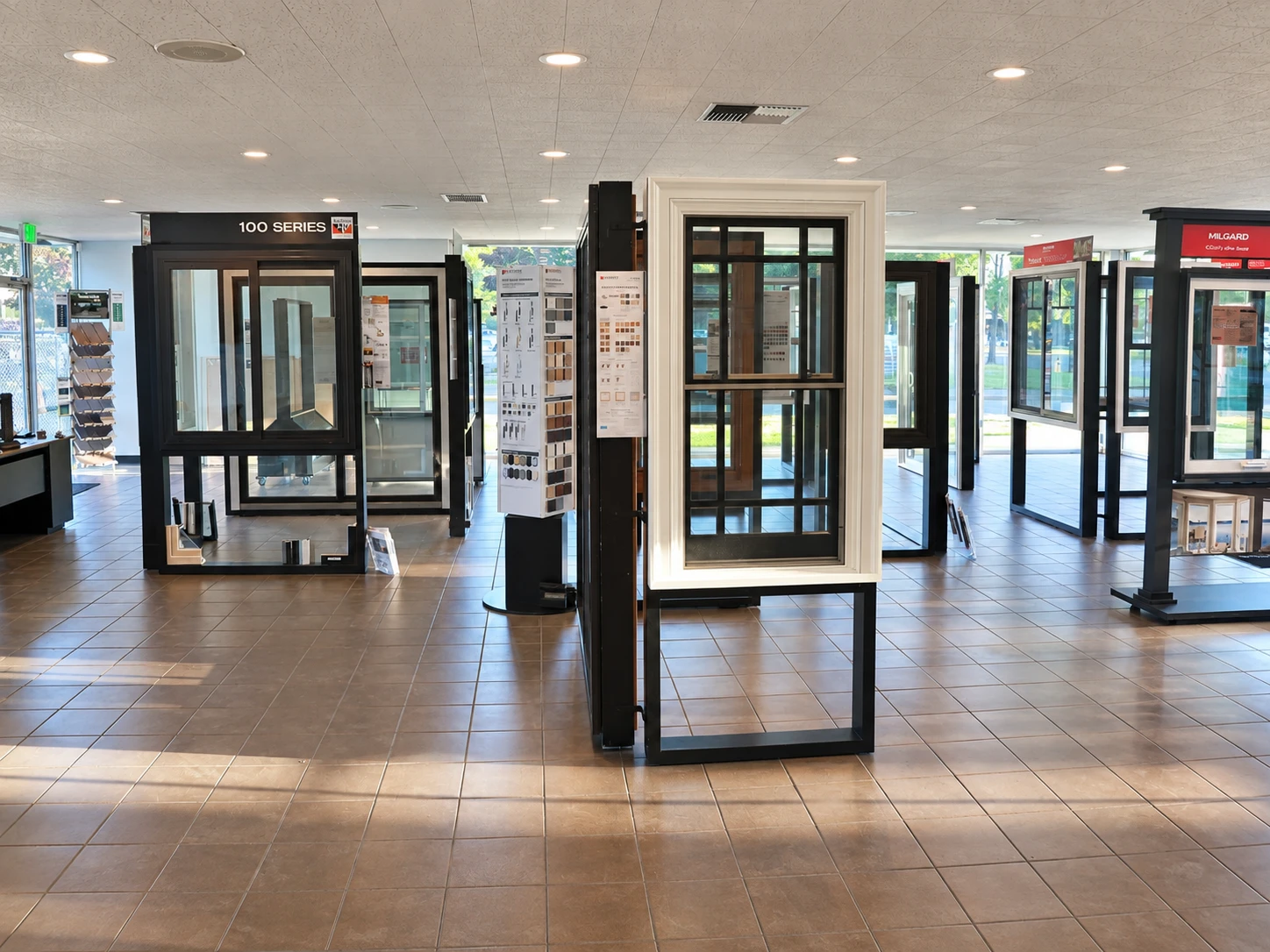 The showroom floor at Emerald City Energy in Tukwila, with full-size Milgard, Andersen and Simonton window displays